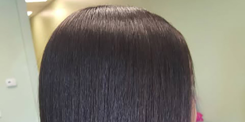 Woman's Hair straightened by Silk Press